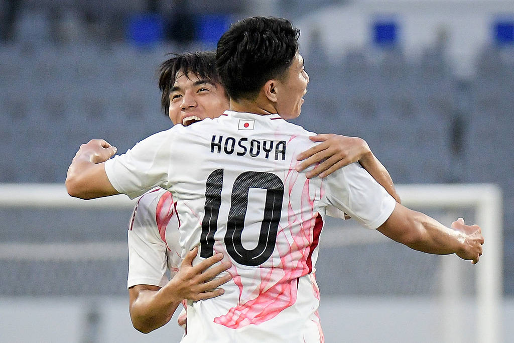 韩国足球联赛_东亚杯-张玉宁失单刀 国足0-2不敌日本遭两连败